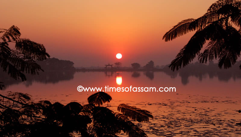 Sun sets over the historic Joysagar, the biggest man made pond of Asia. Sun sets over the historic Joysagar, the biggest man made pond of Asia.