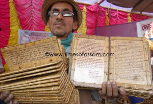 Mohan Saikia, 51, displays his handmade bamboo books at the 48 convention of the All Assam State Science Committee held in Demow in Sivasagar district of Assam on January 23, 2011. Saikia has prepared pages for his books from kako bah(Dendrocalamus hamiltonii), a kind of bamboo used by Assamese craftsmen to make domestic objects like dola and saloni. Mohan Saikia, 51, displays his handmade bamboo books at the 48 convention of the All Assam State Science Committee held in Demow in Sivasagar district of Assam on January 23, 2011. Saikia has prepared pages for his books from kako bah(Dendrocalamus hamiltonii), a kind of bamboo used by Assamese craftsmen to make domestic objects like dola and saloni.