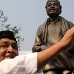 BHUPEN HAZARIKA with STATUE IN GUWAHATI BHUPEN HAZARIKA with STATUE IN GUWAHATI